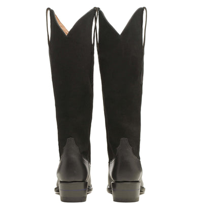 Black leather cowboy boots with stacked block heels, rear view