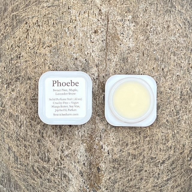 Phoebe Sweet Anthem balm container with pale yellow solid