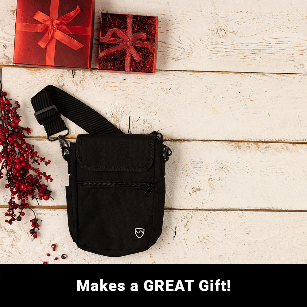 Black phone pouch with top flap, front zipper, and adjustable carry strap