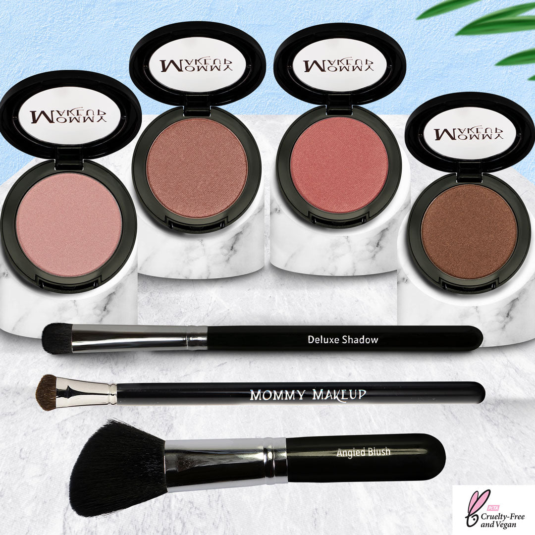 Makeup shade set: four shimmer compacts with two brushes, pink and bronze tones