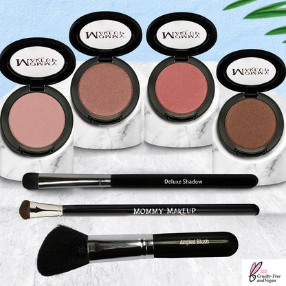 Makeup shade set: four shimmer compacts with two brushes, pink and bronze tones