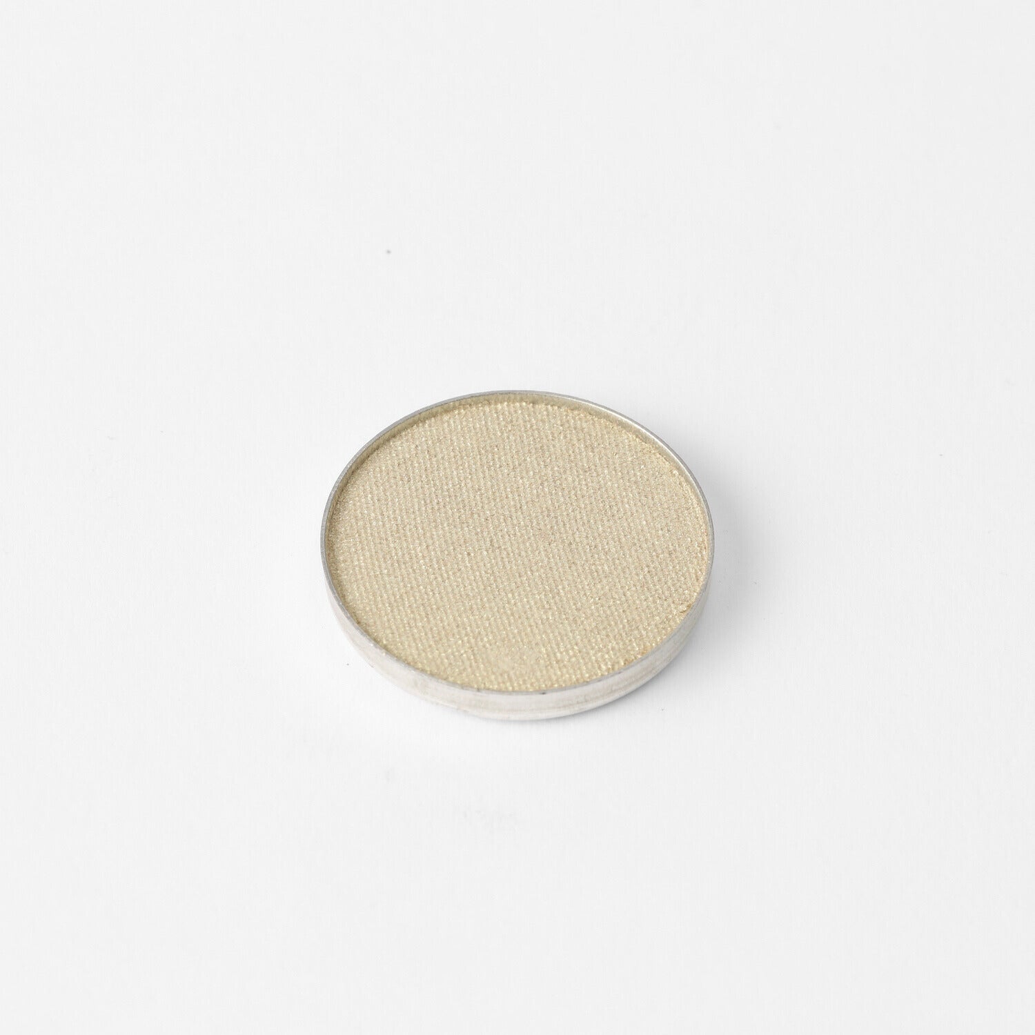 Pressed eyeshadow pan, soft gold-beige shimmer