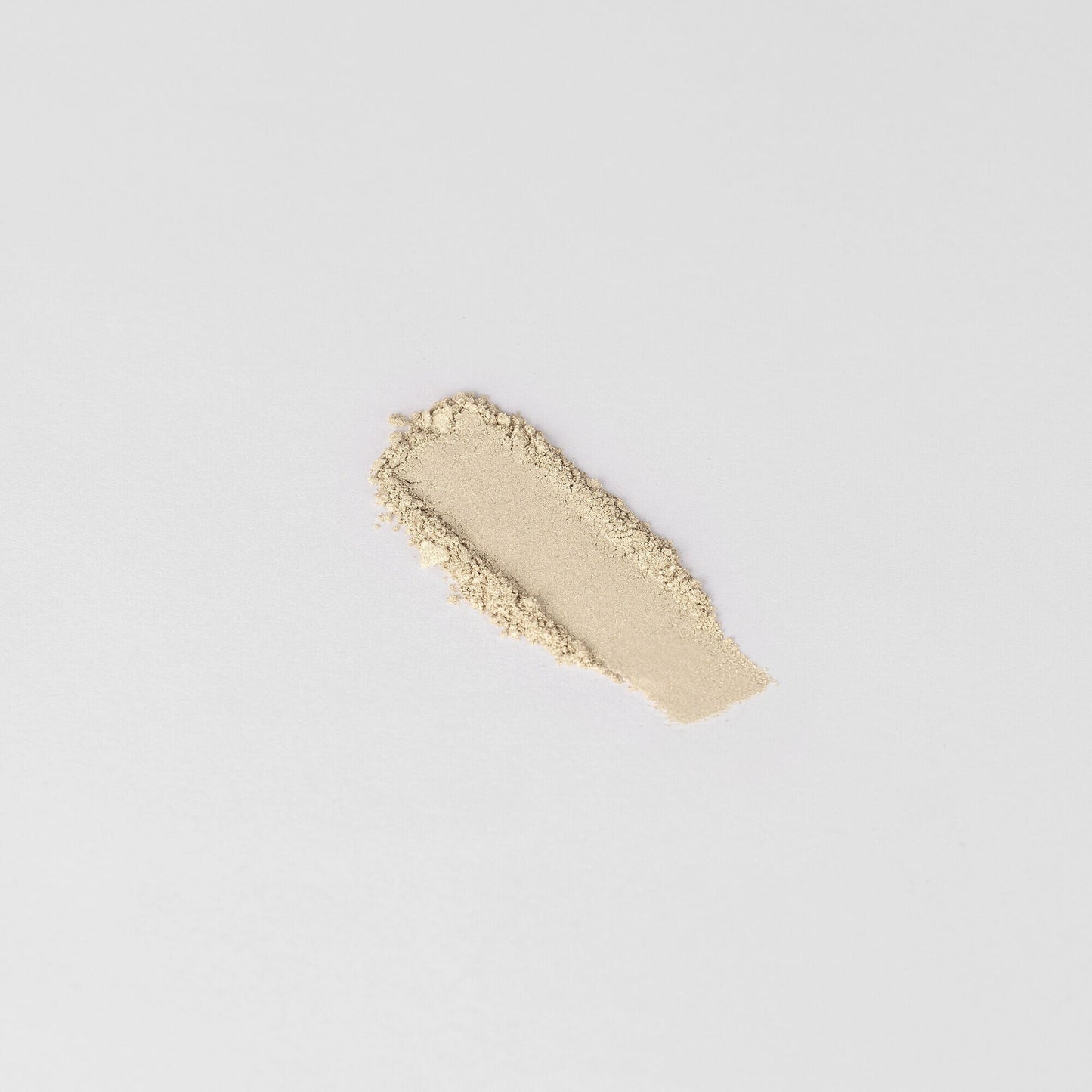 Pressed eyeshadow swatch, creamy beige shimmer