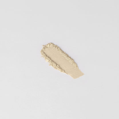 Pressed eyeshadow swatch, creamy beige shimmer