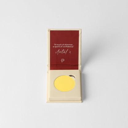 Pressed eyeshadow compact, yellow circular pan