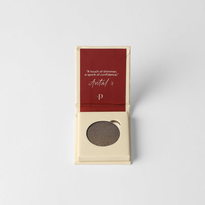 Pressed eyeshadow in case, warm bronze brown shimmer pan