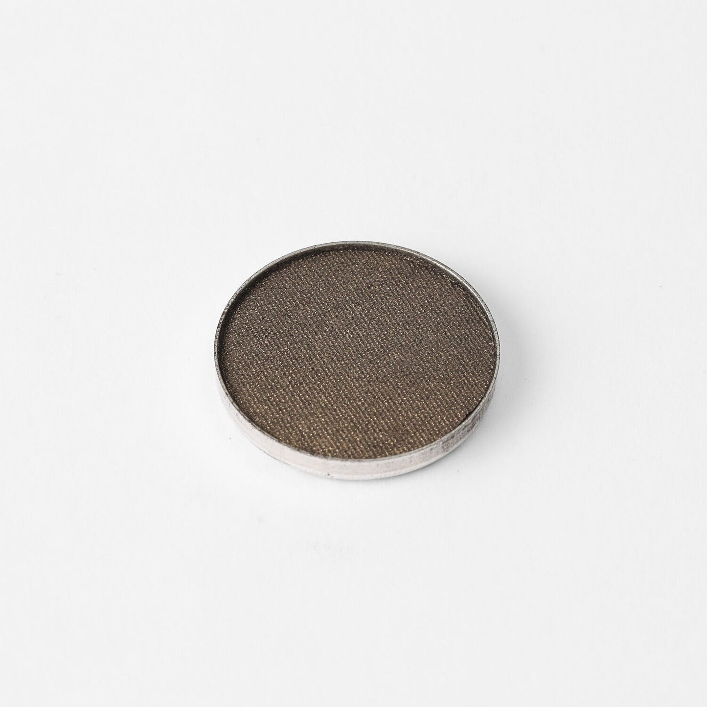 Pressed eyeshadow pan in cool taupe gray shimmer