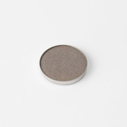Pressed eyeshadow pan in taupe gray shimmer