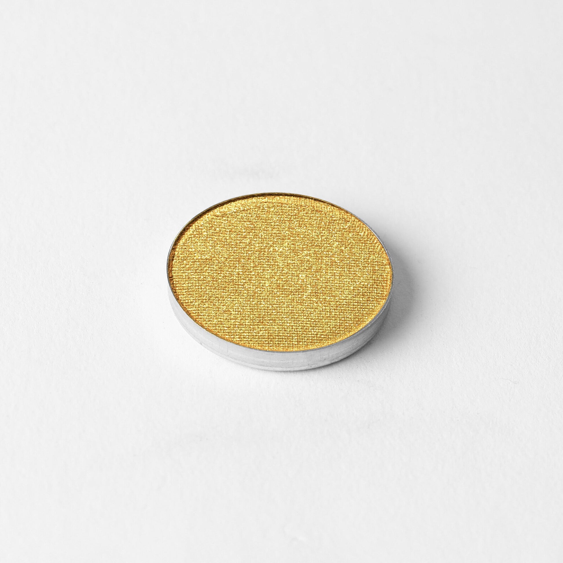 Pressed eyeshadow pan, metallic gold
