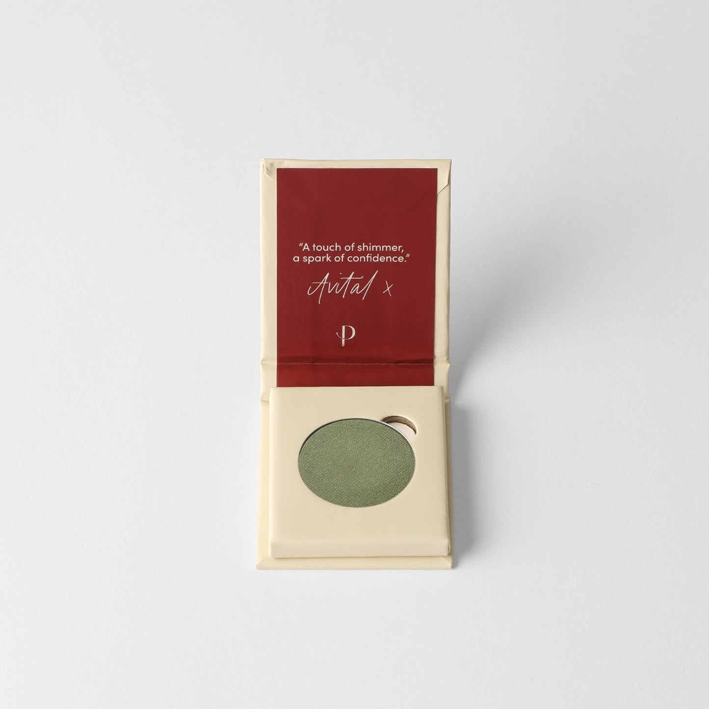 Pressed eyeshadow compact with olive-green pan