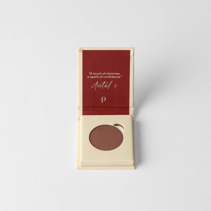 Pressed eyeshadow compact with rose-brown pan