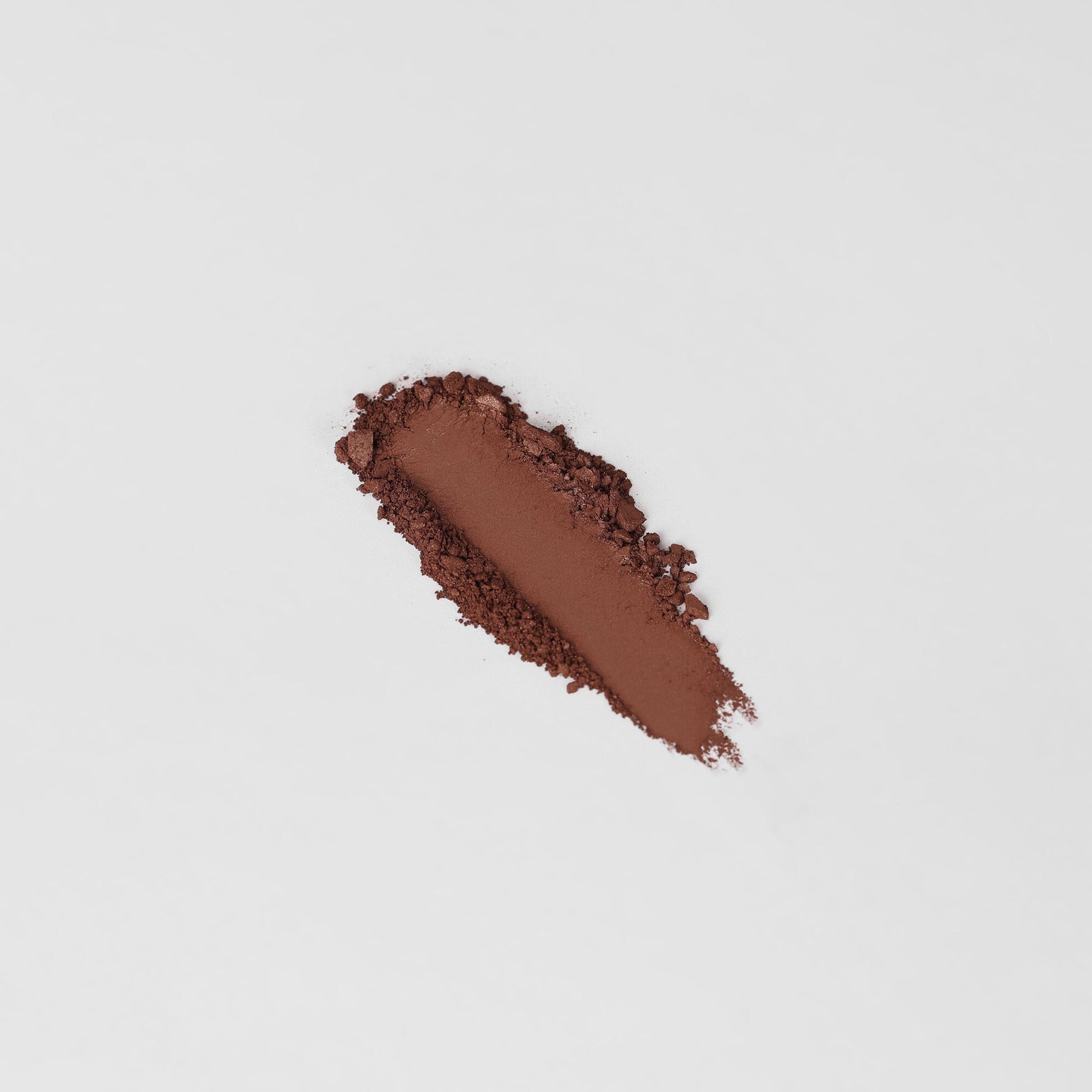 Pressed eyeshadow swatch, deep brown metallic