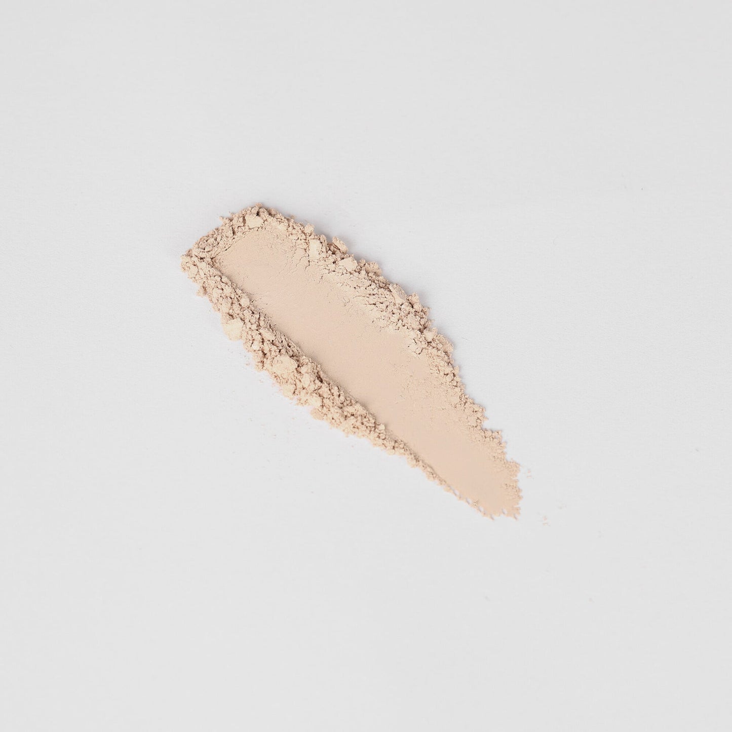 Pressed eyeshadow swatch, pale beige shimmer stripe