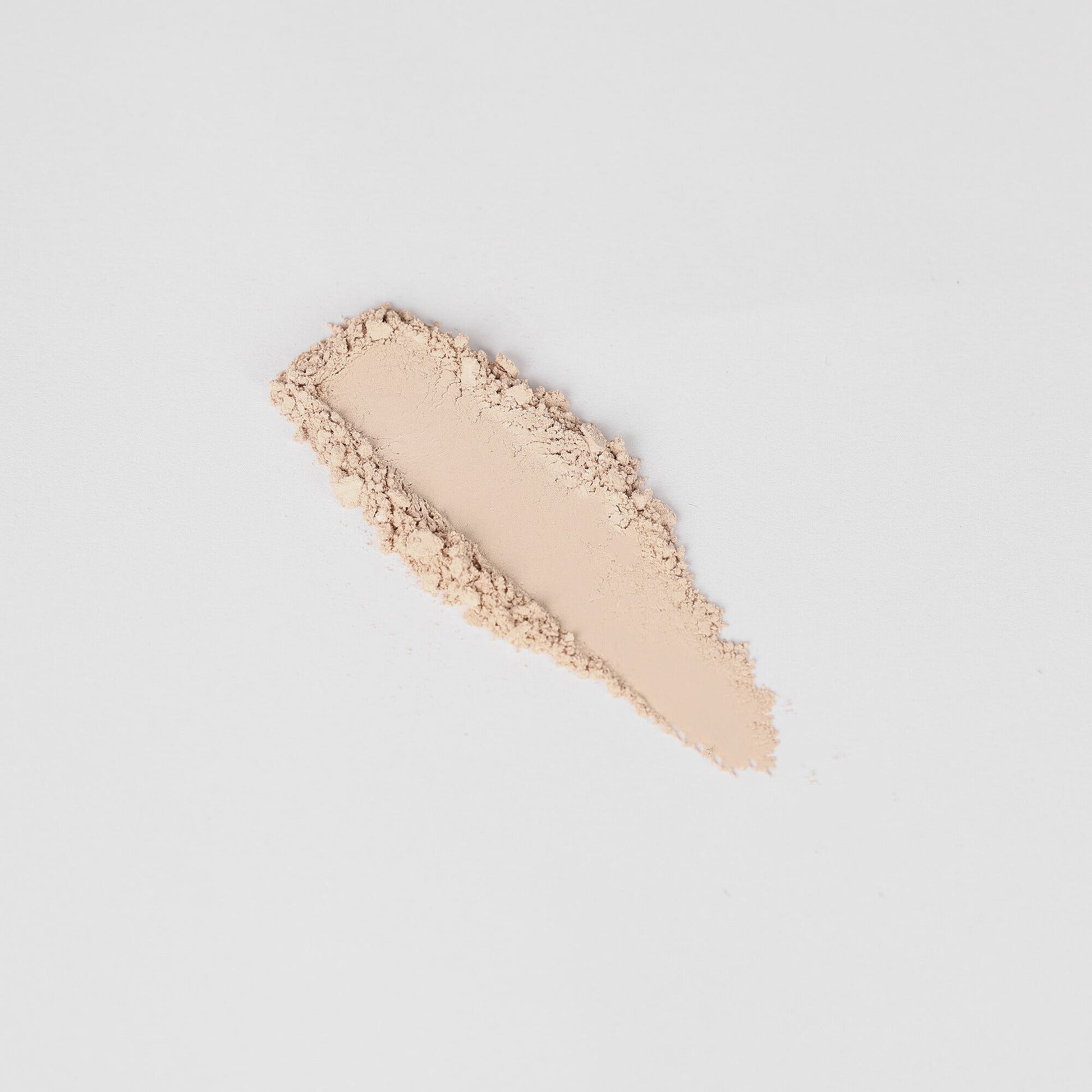 Pressed eyeshadow swatch, pale beige shimmer stripe