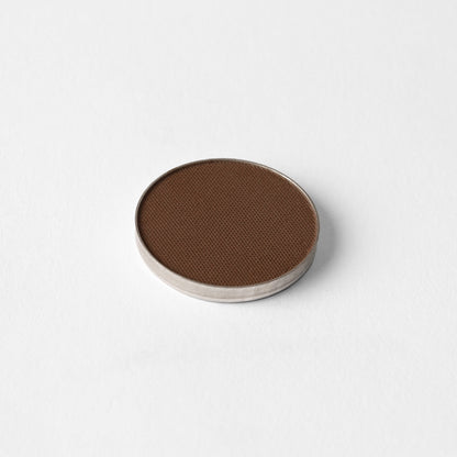 Matte pressed eyeshadow pan, medium-to-dark brown