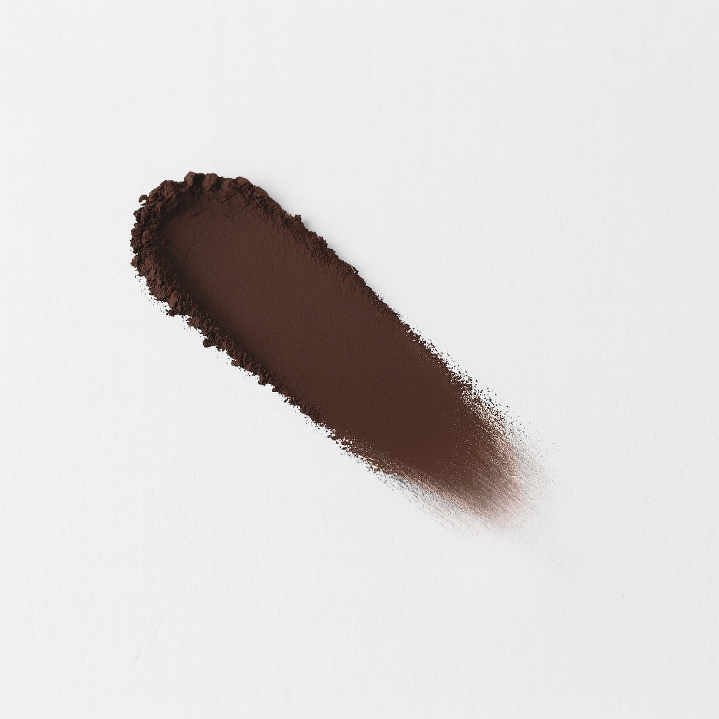 Matte pressed eyeshadow swatch, dark brown on skin