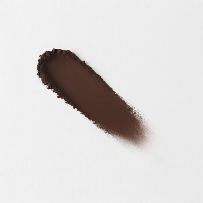 Matte pressed eyeshadow swatch, dark brown on skin