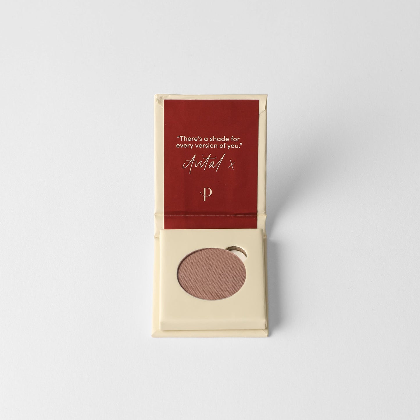 Matte pressed eyeshadow in compact with dark taupe pan