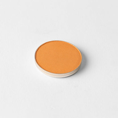 Matte pressed eyeshadow pan, bright orange