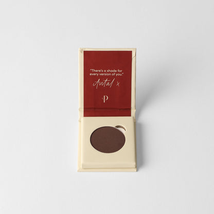Matte pressed eyeshadow pan in box, dark brown shade