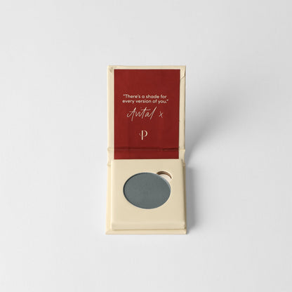 Matte pressed eyeshadow in cardboard box, round gray-green pan