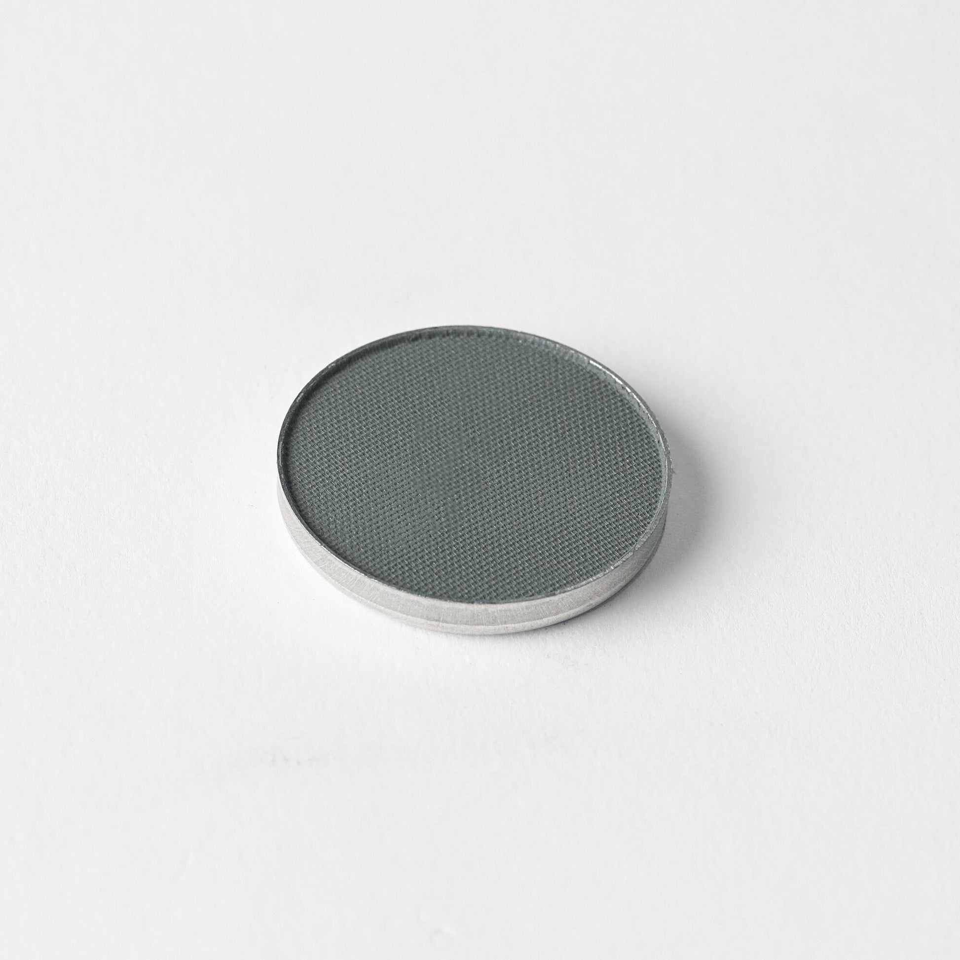Matte pressed eyeshadow compact, muted slate-green pan