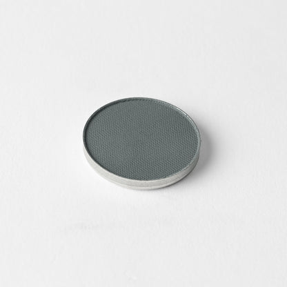Matte pressed eyeshadow compact, muted slate-green pan