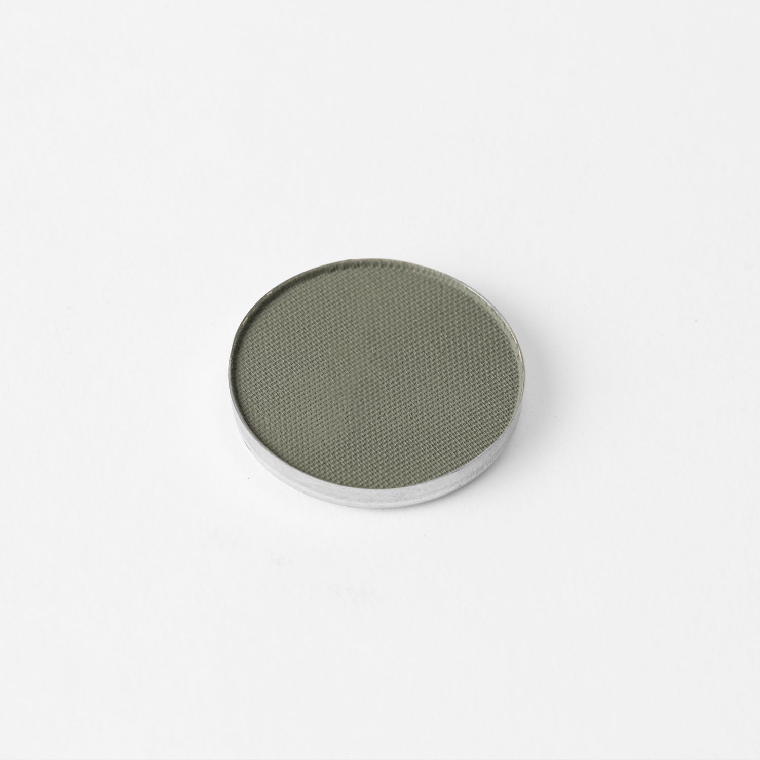 Pressed eyeshadow pan, olive green round compact