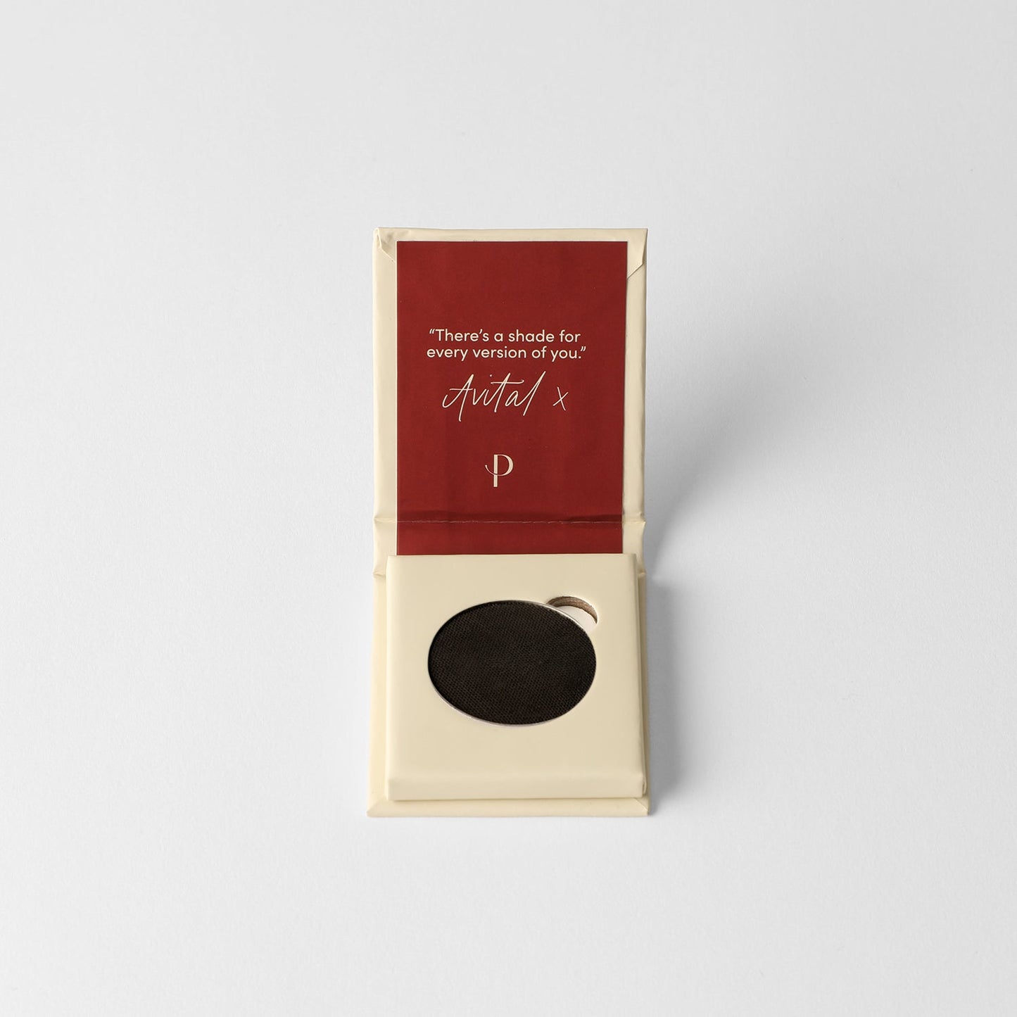 Matte pressed eyeshadow in cardboard box, round deep black pan