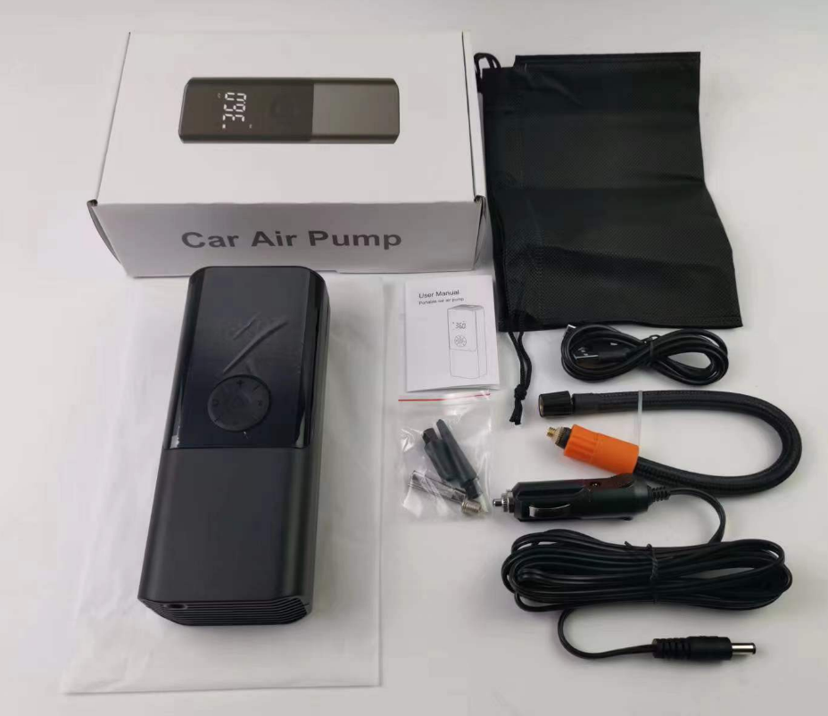 Portable inflator pump kit with manual, cables, and nozzle attachments in a protective pouch.