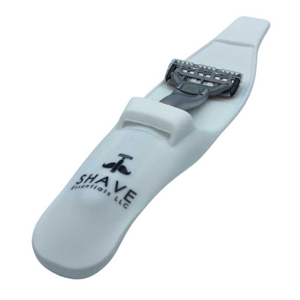 Light gray silicone razor sleeve with snap closure and razor compartment