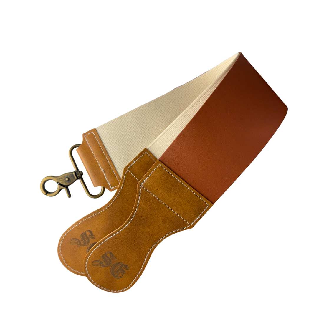 Beige and tan leather razor strop with brass clip and stitched edge seam