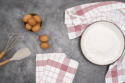 Kitchen towels with red windowpane grid pattern, folded set of towels