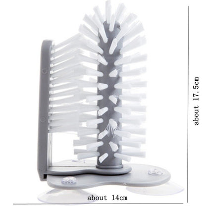 Gray kitchen bottle brush with white bristles, upright brush head on base