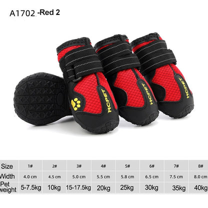 Red reflective dog boots with black straps and patterned rubber outsole, set of three.