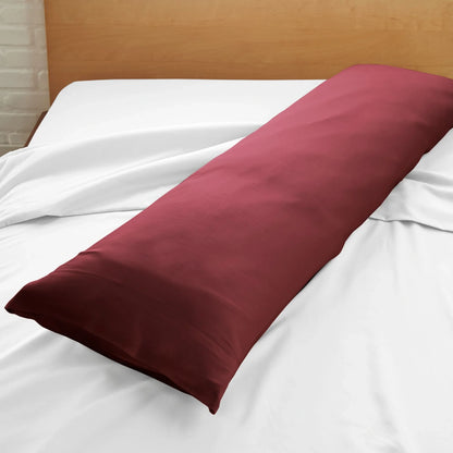 Bamboo body pillowcase in dusty rose, shown on a white bed sheet
