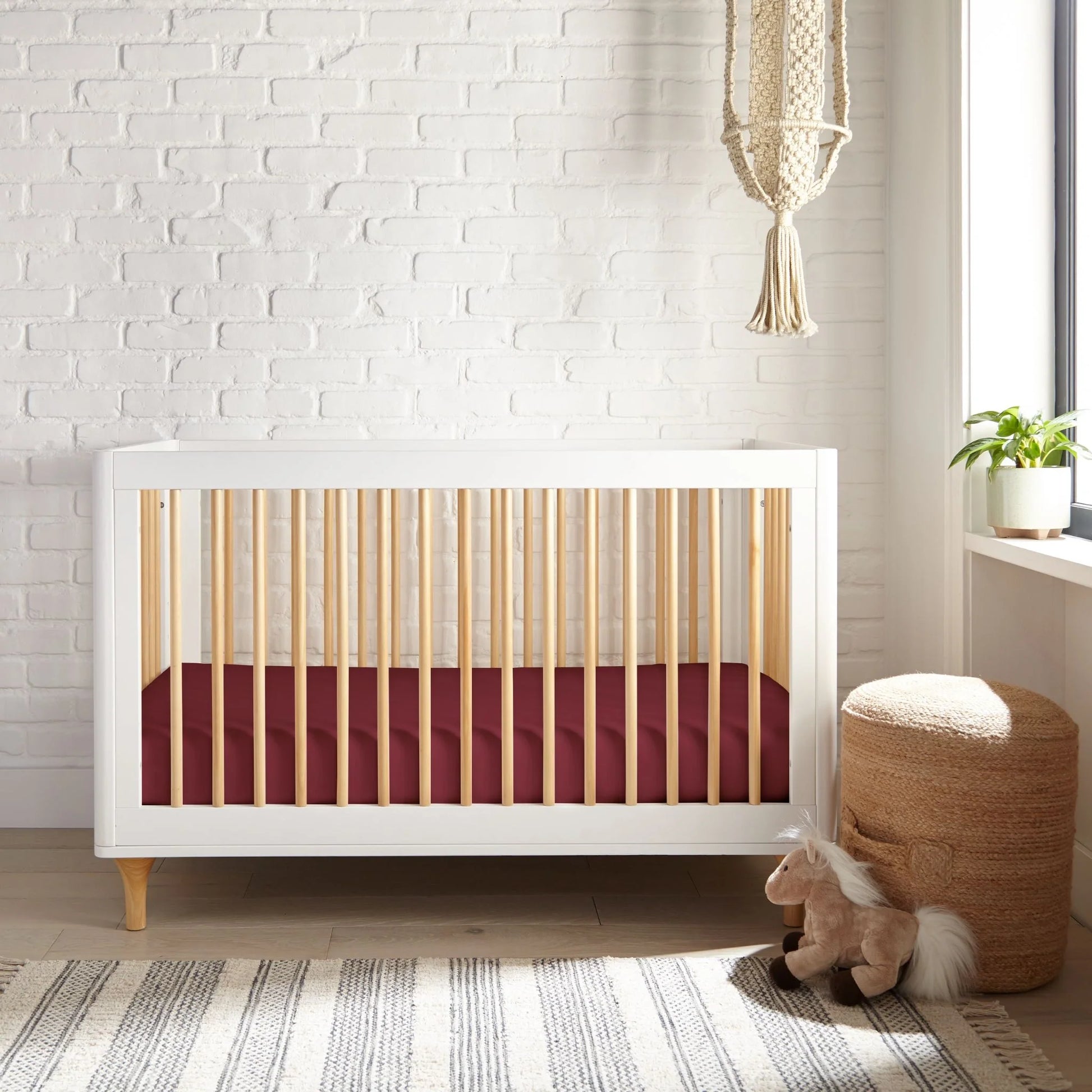 Ruby red crib fitted sheet, snug bamboo cooling fabric for gentle breathability