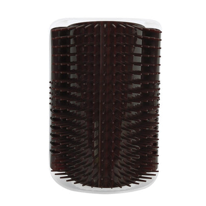 Dark brown corner grooming brush with spiked bristles in a clear container.