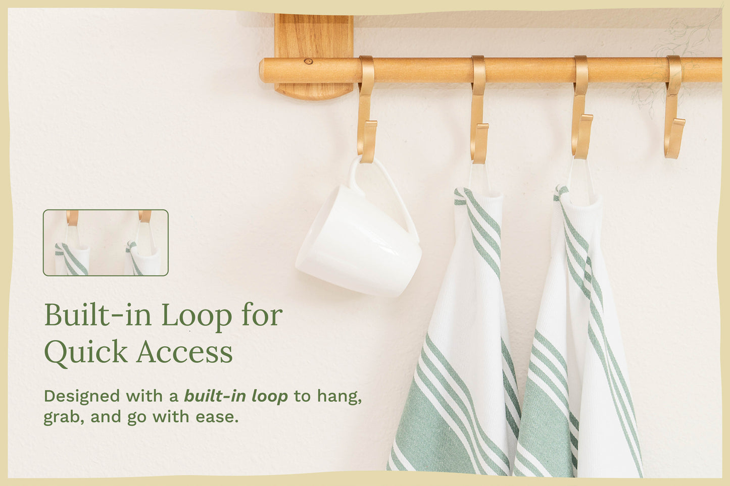 White kitchen towels with green stripes hanging from a wooden rod