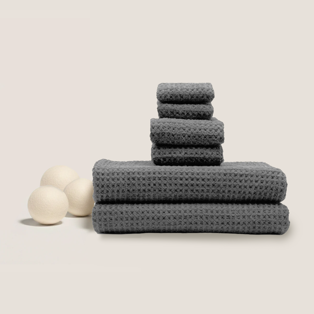 Charcoal waffle cotton towel stack with two towels on top, waffle weave