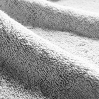 Close-up of a gray terry cotton towel texture with dense loops