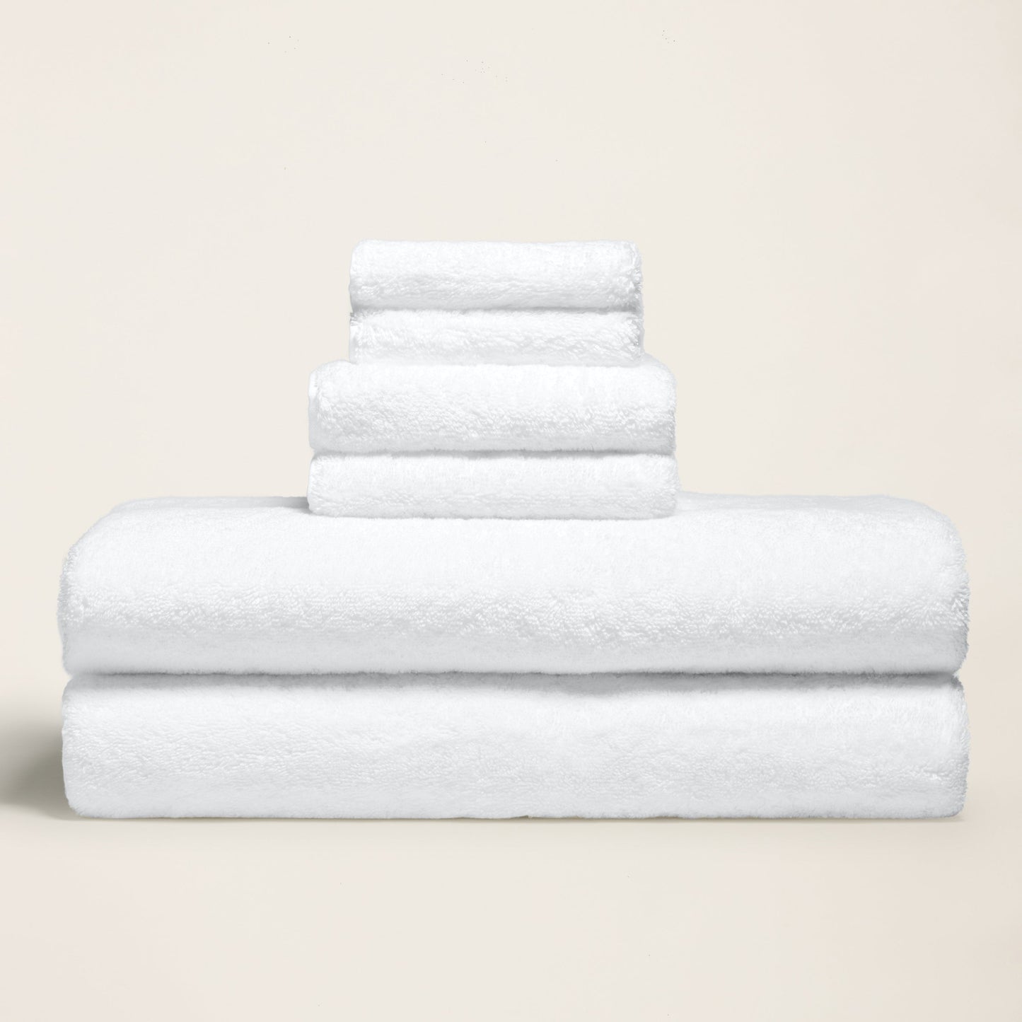 White terry cotton towels, three folded layers with plush looped texture