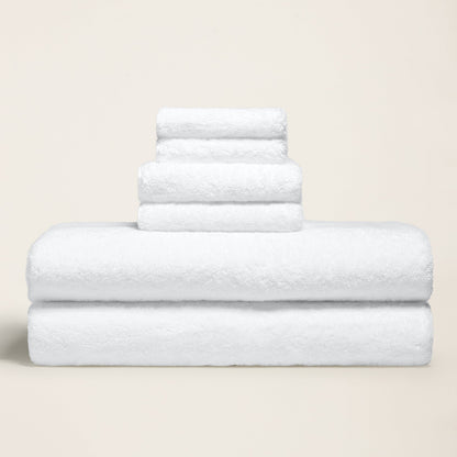White terry cotton towels, three folded layers with plush looped texture