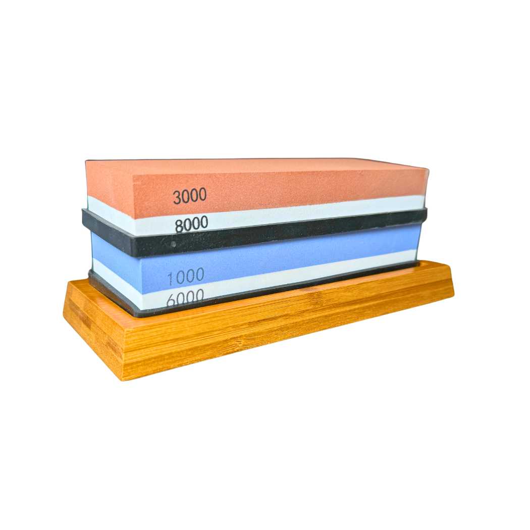 Dual-grit sharpening stone set with 3000/8000 and 1000/6000 grit on wooden base