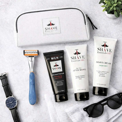 Shave travel kit in zip pouch with blue and pink razors, after shave and shaving cream