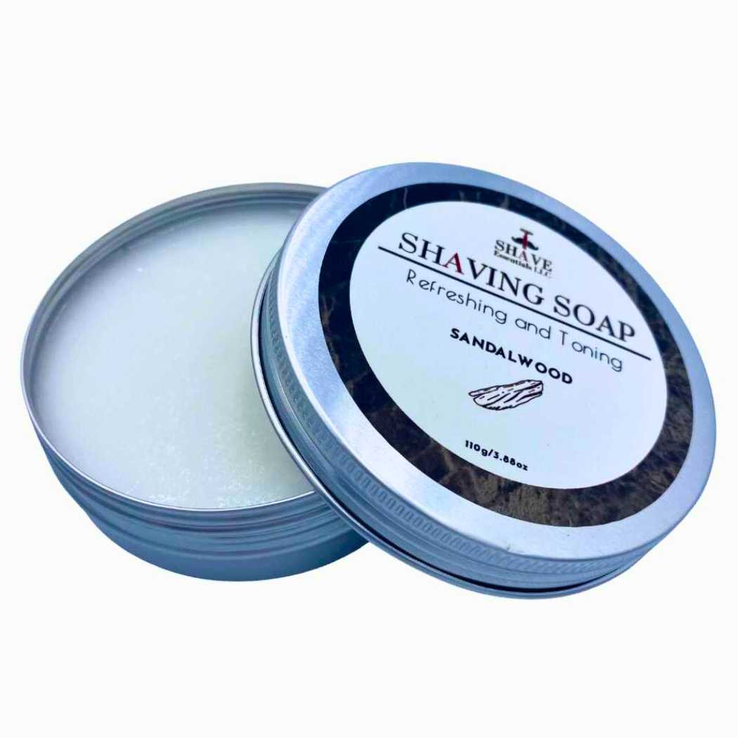 Shaving soap tin with blue lid and exposed soap, Sandalwood label