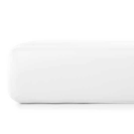 White fitted massage table sheet with snug corners