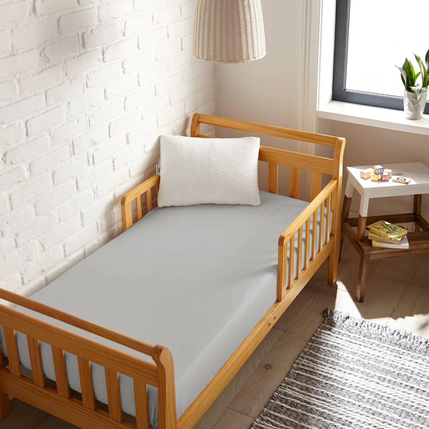 Cooling bamboo crib fitted sheet, white, textured surface on crib mattress