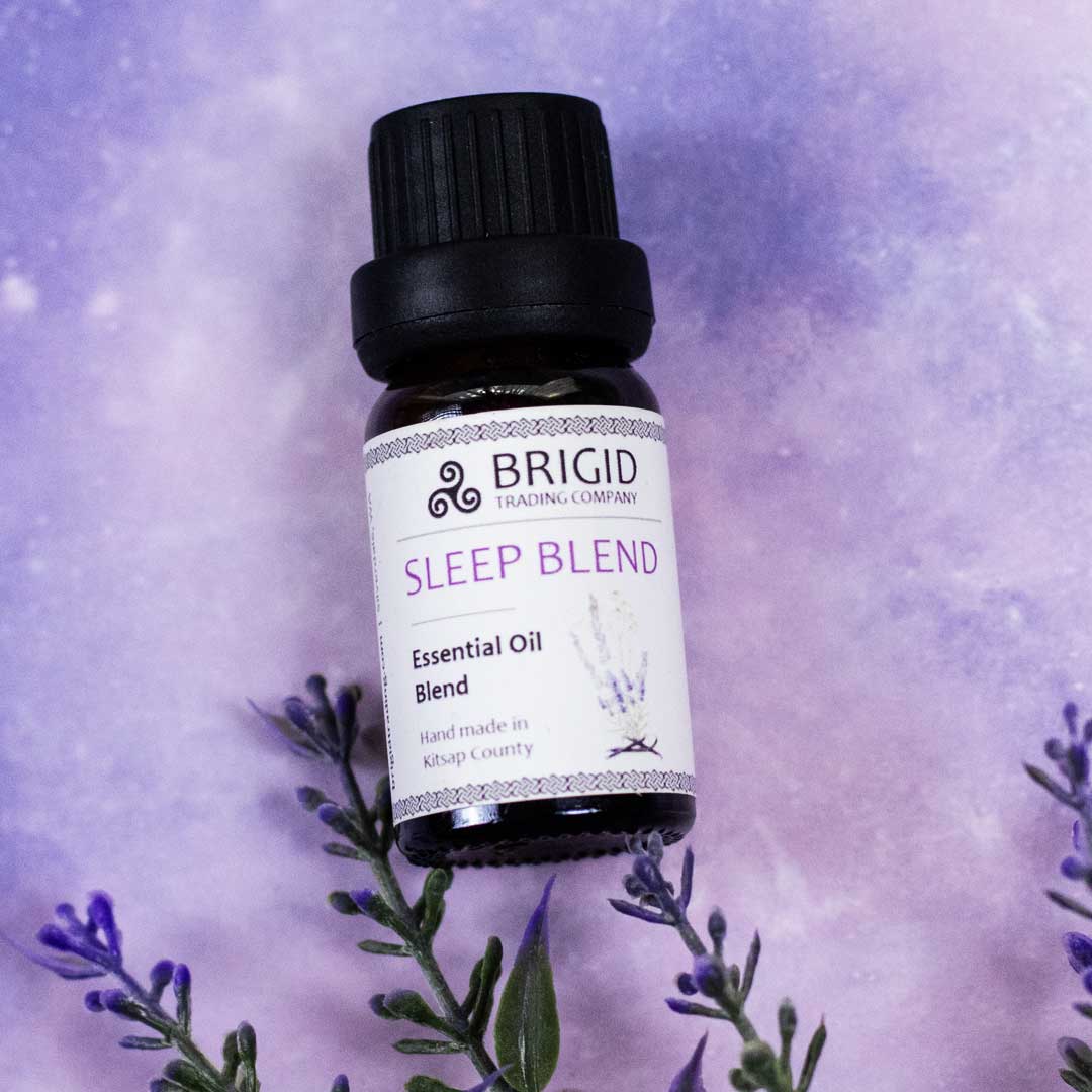 Essential oil blend bottle, Sleep Blend label with black cap and white front tag