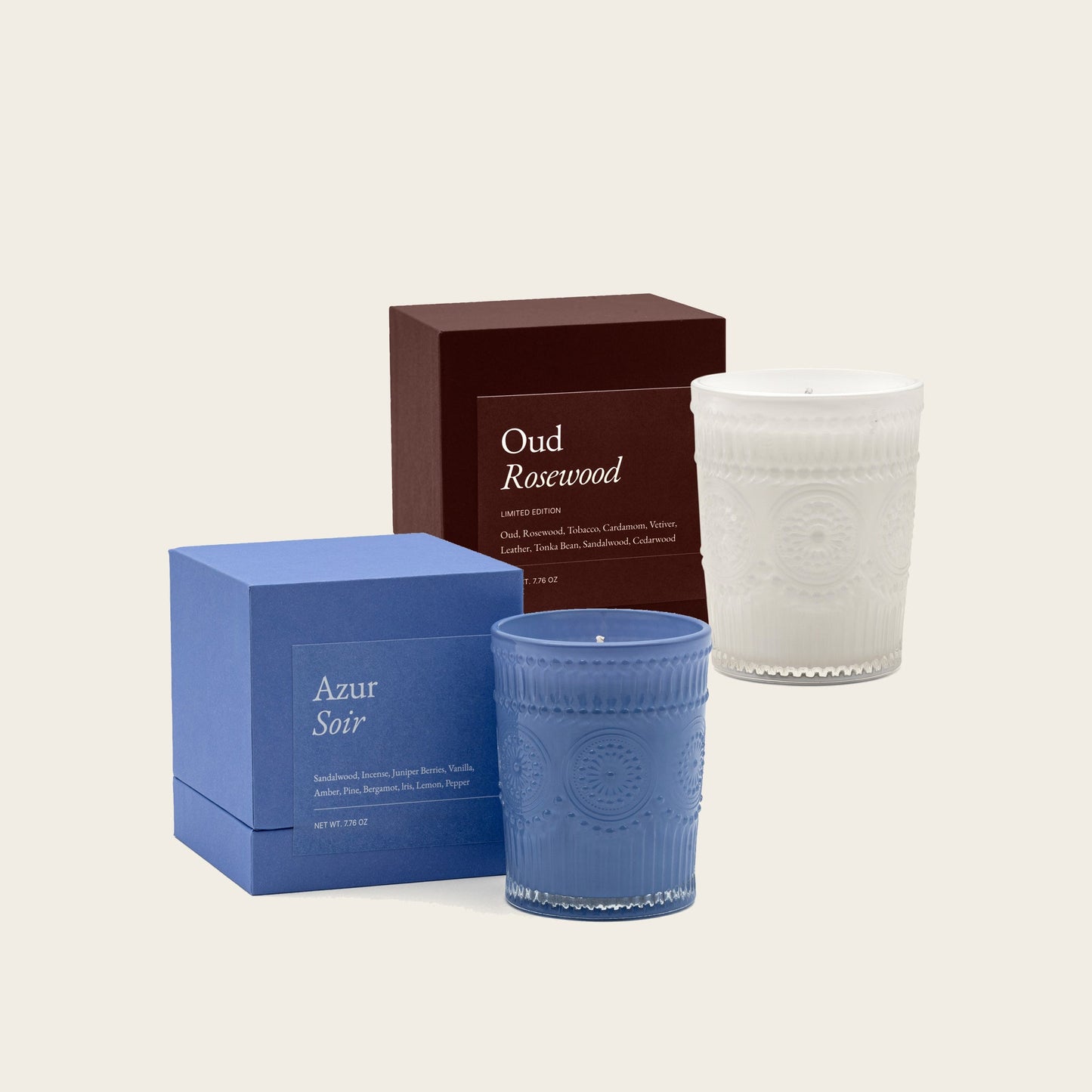 Scented glass candle set with blue and white ribbed jars and gift boxes